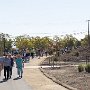 The crowd began touring by walking westward.