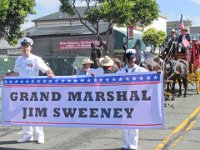 The US Navy provides the Grand Marshal banner.