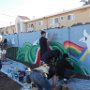 The colorful mural is taking shape on the fence between the park and the homes on the South Side.