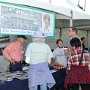 Jim Sweeney and Dorothy Freeman, Jean Sweeney Open Space Park Fund Committee members, talk to visitors to the booth.