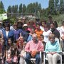 Congradulations! We did it.  Jim & Jean Sweeney, seated, celebrated with friends and neighbors.